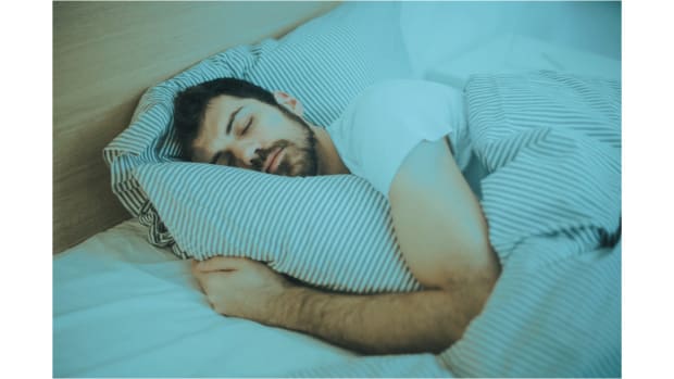 Man Sleeping On Mattress